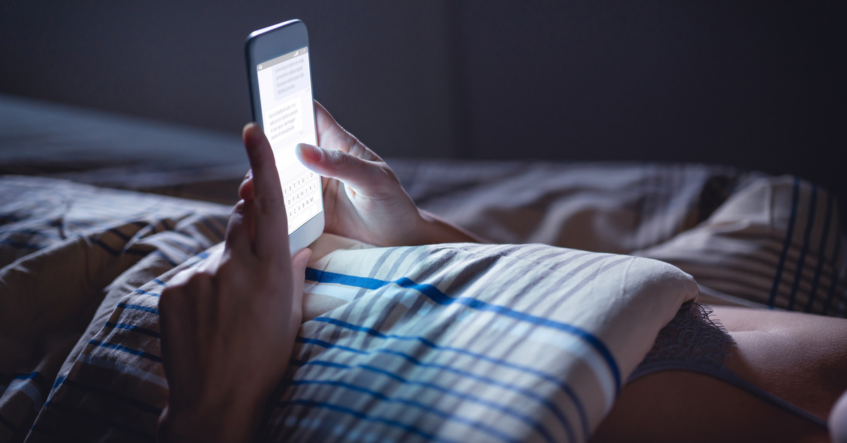 a person sitting on a bed