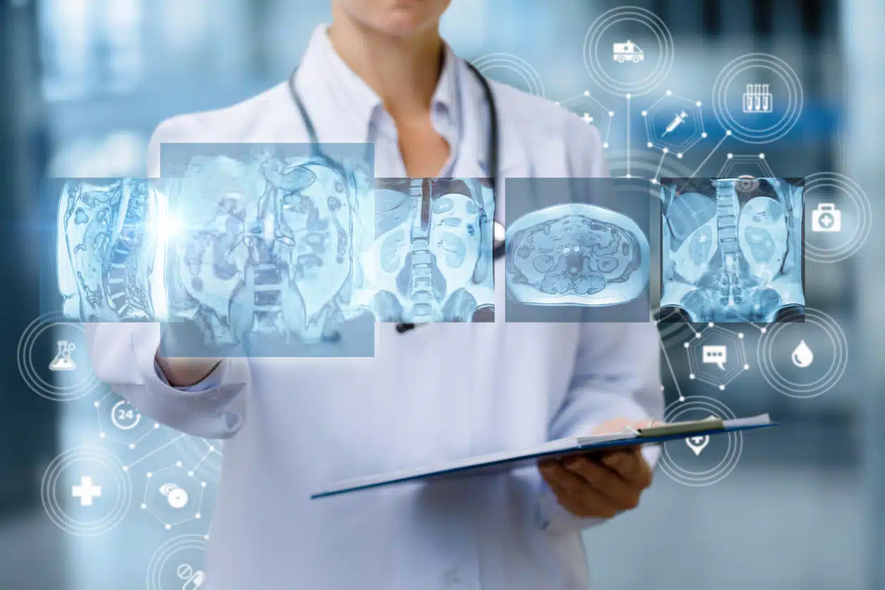 Image of a doctor looking at imaging results floating futuristically in front of them.