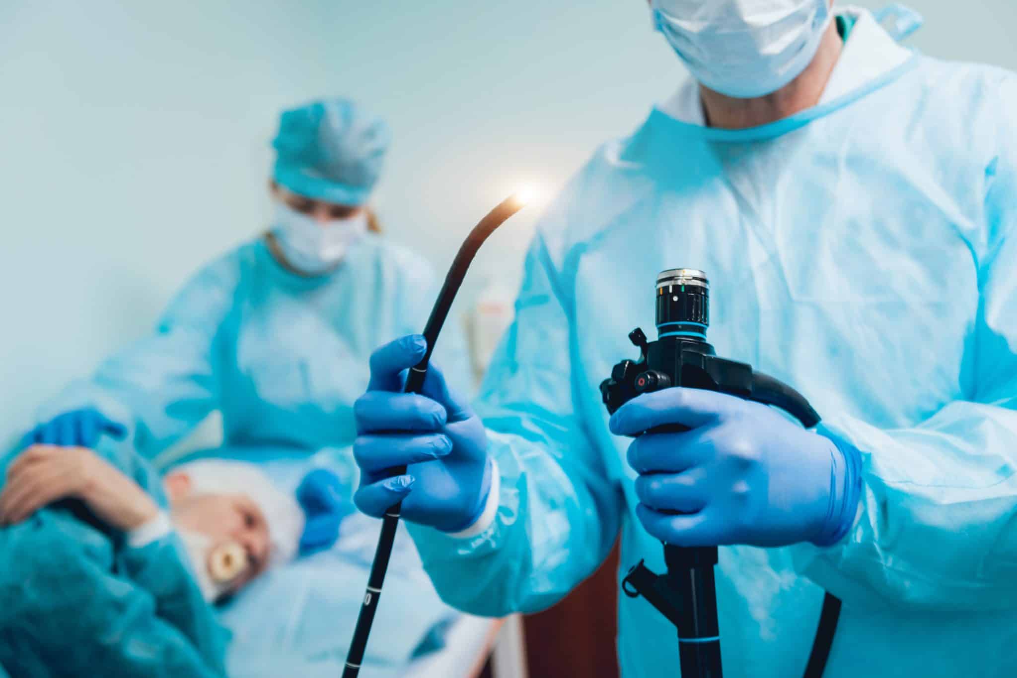 A doctor at UAB medical west preparing to perform an endoscopy procedure on a patient.
