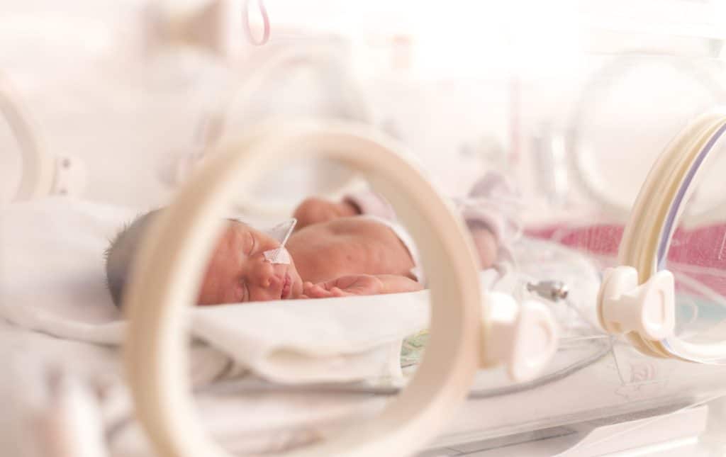 A newborn baby in a level II neonatal care wing at UAB Medical West
